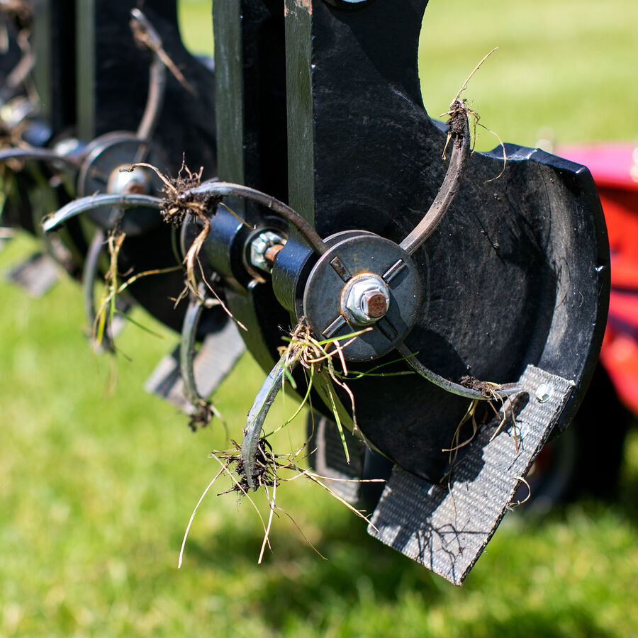 GrandStand® MULTI FORCE Dethatcher Attachment in Use