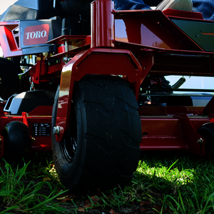 Close up image of the front caster tire with tread