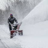 Power TRX - man clearing snow