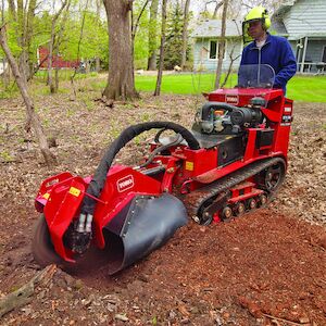 STX38 stump grinding in the dirt