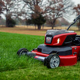 LED Headlights - Mower cutting grass with headlights on