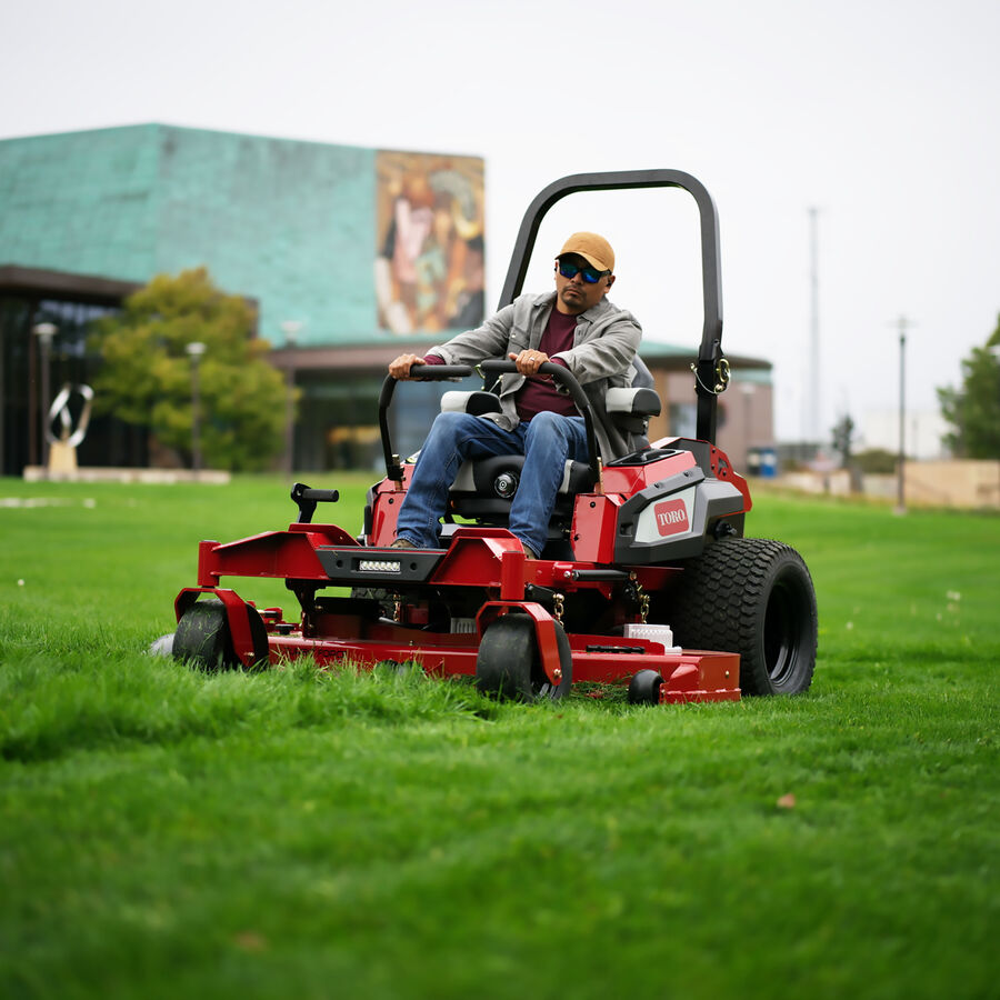 Z Master Revolution mower in use - mowing the lawn of a building