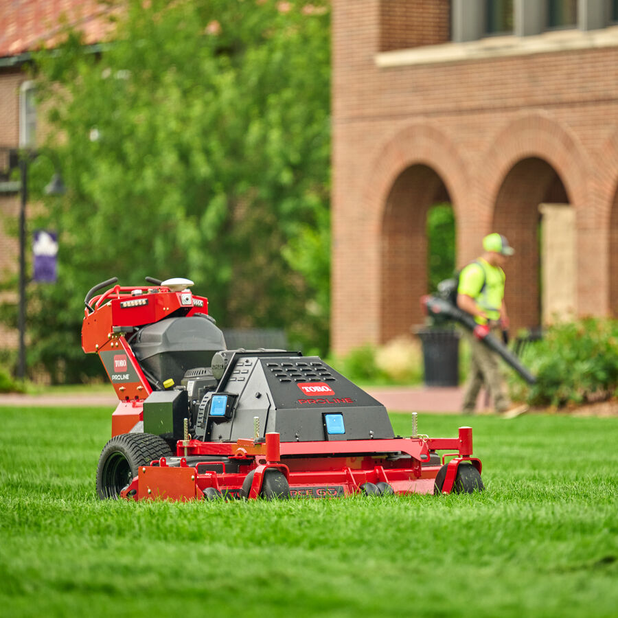 Toro Proline Autonomous Mower on grass with building behind