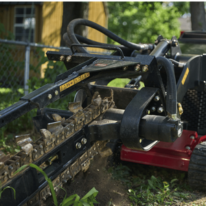Close-up of Dingo 550 trenching