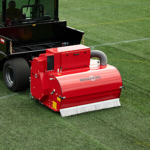 Decompacts and Grooms Playing Surface