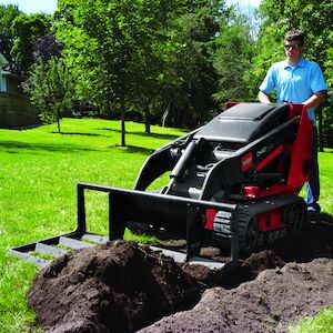 Leveler attachment grading dirt