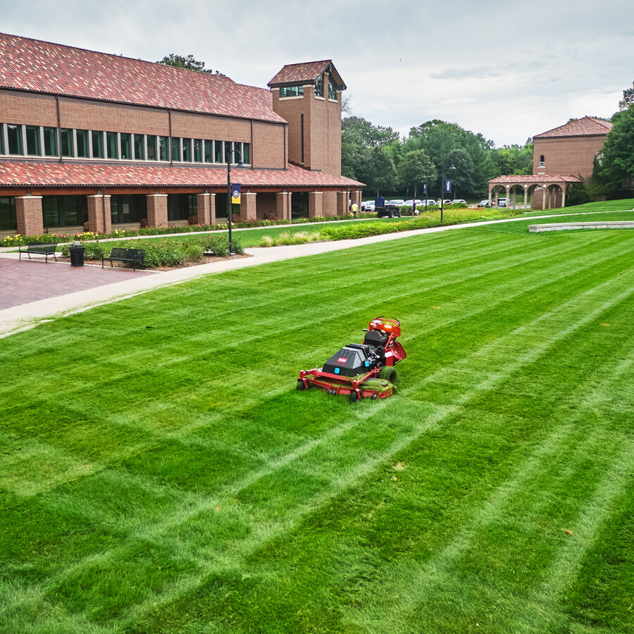 Toro Proline Autonomous Mower mowing a lawn in front of a building