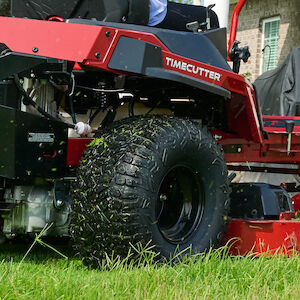 close up image of fender of the mower over the tire