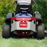 Image showing the back of the mower with the fenders blocking any clippings from blowing on user.