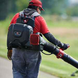 Backpack battery powered leaf outlet blower